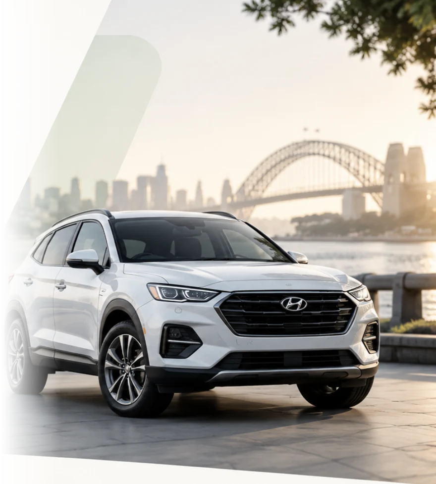 A white SUV by the harbour bridge